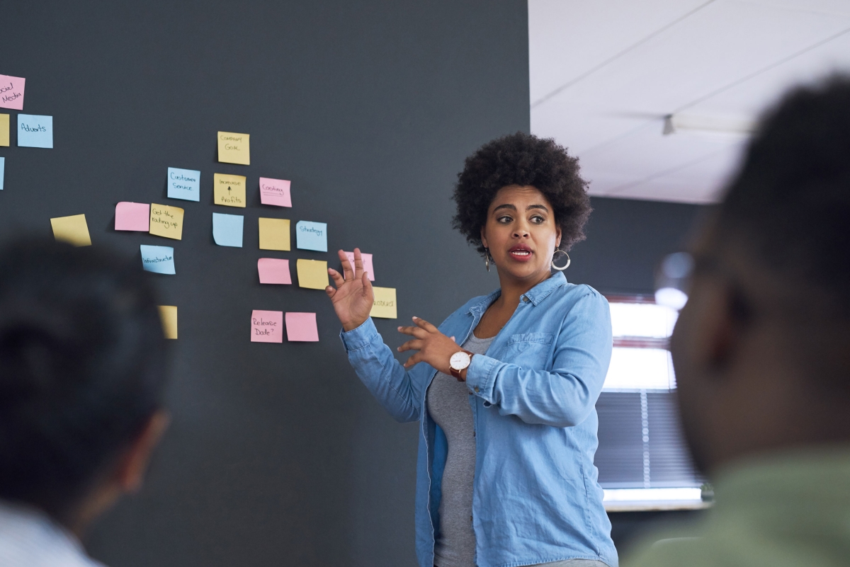 Woman running a training session in an office